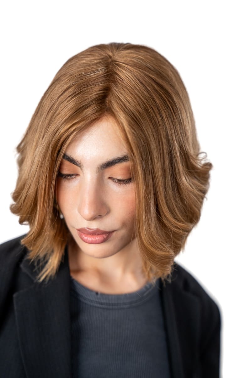 Model with eyes closed, wearing the EUSCEND European virgin hair wig, showing its fine, natural texture and shine