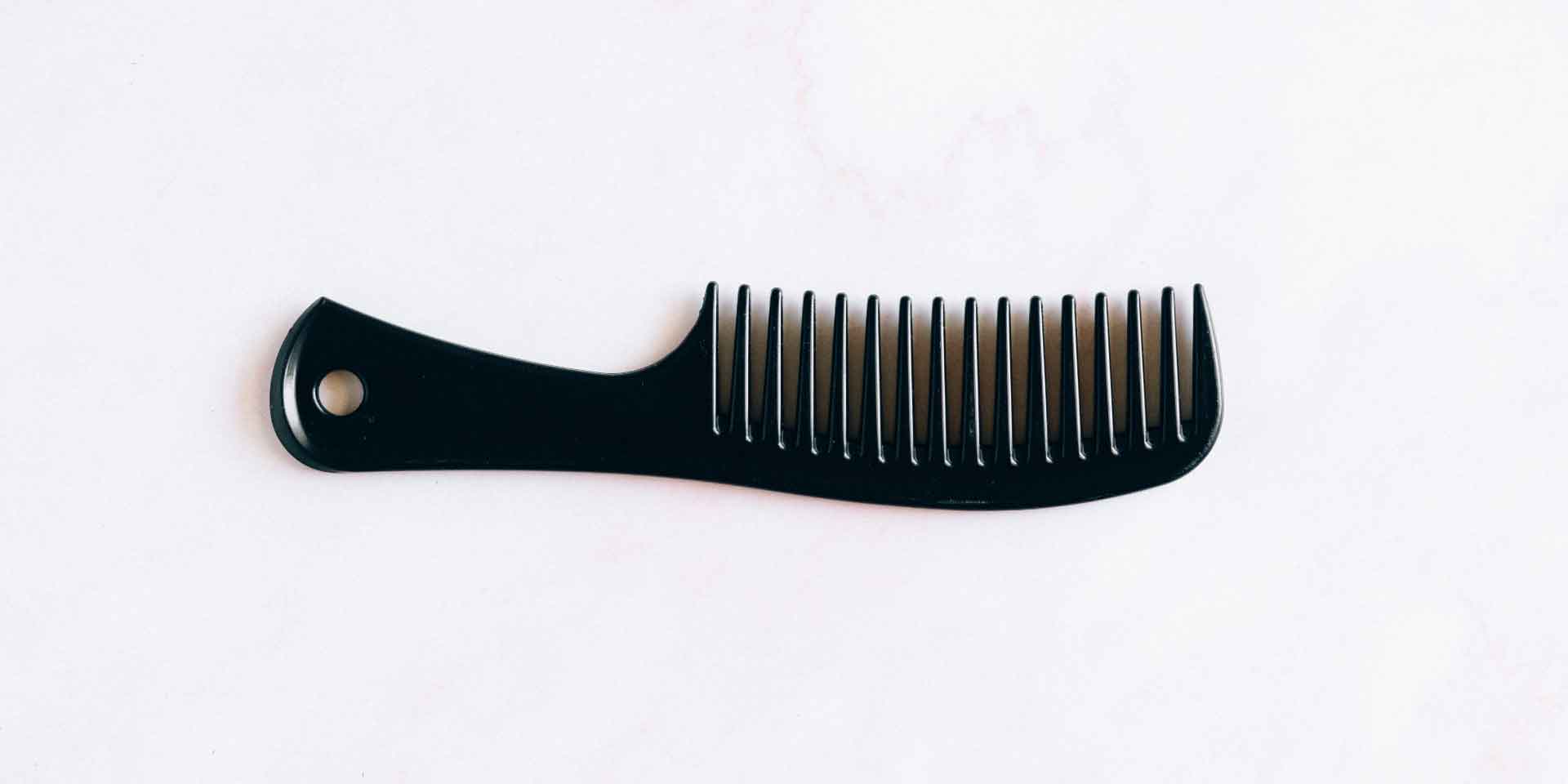 using a wide tooth comb so that you avoid hair shedding